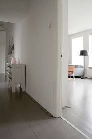 Grey floors add a light elegance to a home. Find A Firm Search The Remodelista Architect Designer Directory Grey Flooring Warm Gray Flooring Painted Wood Floors