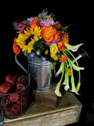 Roses Calla S And Sunflowers Arrangement In A Watering Can Designed By Steven Bowles Creative Naples Sunflower Arrangements Flower Arrangements Arrangement