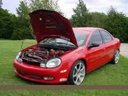 Image result for Medium Red 2000 Dodge