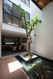 Buat Rumah Sejuk Ini 12 Inspirasi Desain Kolam Ikan