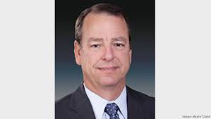 Maxim Crane CEO Bryan Carlisle retires