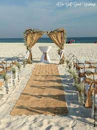Beach Wedding By Ido Gulf Coast Weddings Burlap Archway Shepherd Hooks With Mason Jars And Babies Breath Bur Gulf Coast Wedding Orange Beach Wedding Rentals