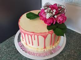 Buttercream iced cake with fresh flowers. First Time Decorating With Fresh Flowers I Perhaps Could Have Added Some Macarons Or Meringue Kisses Cakedecorating