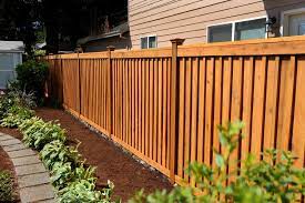 Cedar board and batten costs $1 to $2 per square foot and uses overlapping vertical, rather than horizontal, boards. Cedar Wood Fences Oregon Washington Rick S Custom Fencing Decking Wood Fence Design Cedar Wood Fence Fence Design