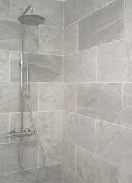 Browse photos of bathroom remodel designs. Gray Tile Bathroom
