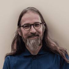 My word of the year is play! In that spirit, I built this little guy  between shovelling and more shovelling — possibly the first snowman I've  ever made. I am leaving the