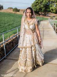 Lovely Indian Bride In A Cream And Gold Lengha Indian Bride Outfits Gold Lehenga Bridal Indian Bridal