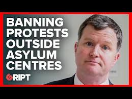 FF Senator questioned about banning protests outside asylum centres