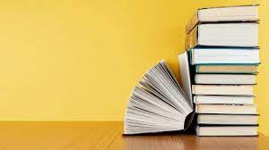 Front View Pile Of Books With Copy Space Pile Of Books Powerpoint Background Design Freepik