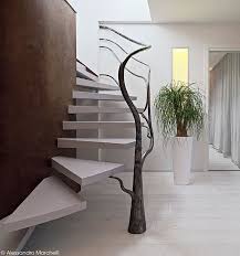 A tree branch can be used to craft a stone axe, stone hammer and wooden spear. A Tree Like Sculpture Acts As A Railing For These Stairs