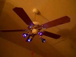 Check this level by selecting a point on the ceiling above the tip of one of the blades. Seagull Lighting Ceiling Fan With Wood Blades And Purple Bulbs Youtube