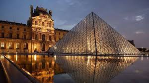 Pei, surrounded by three smaller pyramids, in the main courtyard. Musee Du Louvre Les Trente Ans De La Pyramide