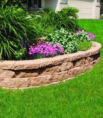 Build Something Beautiful With Retaining Wall Blocks From Menards From Diy Firepits Garden Front Of House Landscaping With Rocks Flower Bed In Front Of House