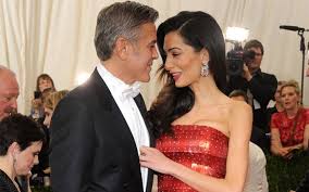 From her work as a high profile barrister to raising twins with husband george clooney, acclaimed human rights activist amal clooney is a style role model for the modern woman. George And Amal Clooney Expecting Twins No Divorce Movies News