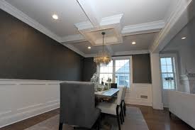 The style of light fixtures placed within the panels and the wood panels themselves look great with the rest of the room's aesthetic. Coffered Ceiling Trim Nj