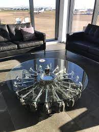 Shop coffee and cocktail tables and other modern, antique and vintage tables from the world's best furniture dealers. A Highly Polished Glass Top Coffee Table Fashioned From A Radial Engine Looks Simply Stunning From Mobel Aus Autoteilen Fahrzeugausstattung Wohnzimmertische
