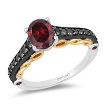 enchanted disney villains evil queen oval garnet and 1 4 ct t w diamond ring in two tone sterling silver and 10k gold