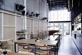 Pallets Used To Define Interior Space In The Industry Beans Cafe Australia Australian Interior Design Interior Design Awards Cafe Design
