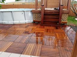 Add The Beauty Of Hardwood To Your Outdoor Space With Deck Tiles Installing Hardwood Deck Tiles Is A Breeze And They Re Deck Design Building A Deck Deck Tiles