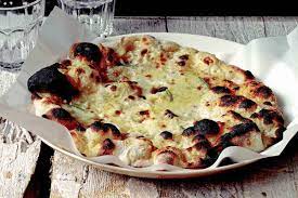 This White Pizza Recipe Made With Pizza Dough Bechamel And Cheese Is From Jim Lahey No Tomato Sauce The Perfect Appetizer Jim Lahey Pizza Recipes Recipes