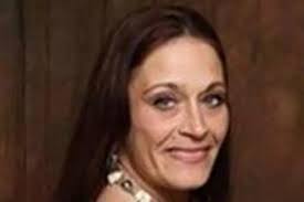 Woman's body found in freezer by teenage son as bizarre death remains a  mystery