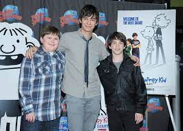 Young curly short role diary of a wimpy kid: Devon Bostick Pictures Diary Of A Wimpy Kid Rodrick Rules Cast Visits Planet Hollywood Zimbio