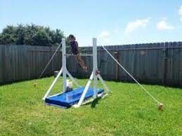 Updated Diy Gymnastics Bar Our Coupon Adventures Diy Gymnastics Bar Gymnastics Bar Gymnastics At Home