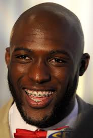 A nice moment with LSU nice guy Les Miles