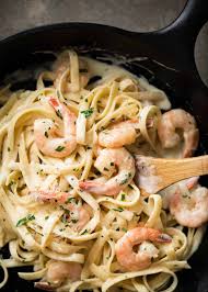 Cook, whisking occasionally, for 3 to 4 minutes or until sauce begins to thicken. Creamy Garlic Prawn Pasta Recipetin Eats
