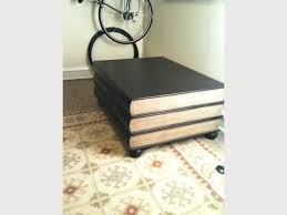 The perfectly round shaped amazing table has got a finish of faux marble which makes it elegant. Sturdy Coffee Table Shaped Like Stacked Books Apartment Therapy S Bazaar