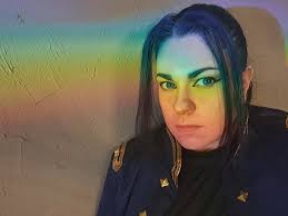 Cait cosplay photos with rainbow background