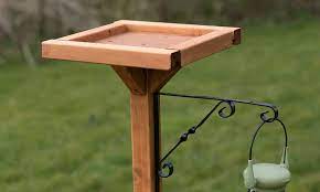 23.5 inches x 16.5 inches 2 ladders to climb 3 toys added for play time plastic chain to hand more toys 3/4 and 1/2 dowel perches Open Bird Tables Feed Wild Birds Out In The Elements Bird Barn