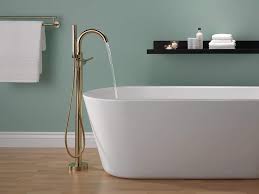 But this trend is anything but the brash and brassy '80s look we'd all like to forget—today's designs feature a softer finish that radiates. Delta Trinsic Floor Mount Freestanding Tub Filler With Hand Held Shower Champagne Bronze T4759 Czfl Valve Not Included Tub And Shower Faucets Amazon Com