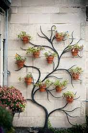 you have a tiny garden a courtyard or even a patio and you are desperate because of i deco mur exterieur jardin deco mur exterieur decoration murale exterieur