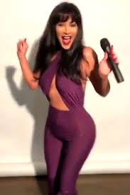 Even we were shocked to. My Fave Selena Kim Kardashian Dresses Up As The Late Queen Of Tejano Music With Iconic Purple Jumpsuit People Com