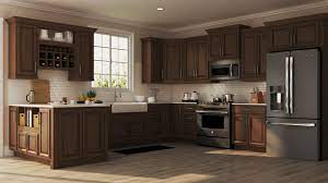 Visit a kitchen design showroom or two to examine and manipulate different types of wood, metal, composite, laminate, and thermofoil doors to determine which cabinet material. Hampton Wall Kitchen Cabinets In Cognac Kitchen The Home Depot