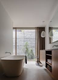 Your bathroom, whether the master or a small powder room, should be a sanctuary. Photo 37 Of 422 In Bath Undermount Photos From A Sunken Courtyard Anchors This Concrete Home To Its Steep Waterfront Site Dwell
