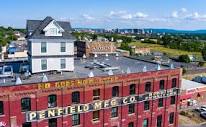 Here's what Syracuse's famous house on a factory roof looks like ...