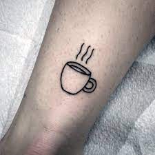 Drip or french press, sweet or spiked, a good cup of coffee is nothing short of a work of art, so why not devote a little skin to some tattoo art in honor? Top 50 Small Creative Tattoo Ideas 2021 Inspiration Guide Cup Tattoo Coffee Cup Tattoo Coffee Tattoos