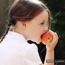 Download apple images and photos. Girl Eating Apple Close Up Brown Hair Stock Photo 127274238