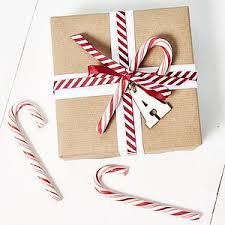 Christmas wrapper christmas candy bar christmas favors holiday candy christmas chocolate all things christmas holiday fun christmas holidays christmas crafts. 21 Christmas Gift Wrapping Ideas That Make Anyone Look Like A Decorating Professional First For Women