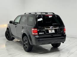 Image result for Tuxedo Black 2011 Escape