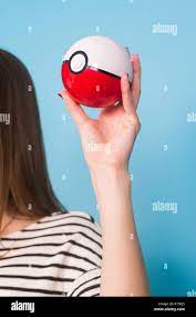 Ufa, Russia - July 8, 2017: woman holding pokeball with pikachu. pokemon go  multiplayer game Stock Photo - Alamy