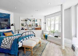 Our Guest Room Office Basement Suite Reveal How To Make A Basement Office Feel Warm Happy And Functional Emily Henderson Guest Room Office Living Room Update Home