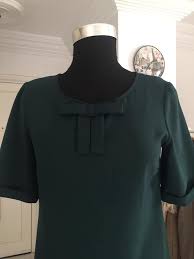 Un affichage sous forme de stands. Robe Marque 123 Taille 38 Vide Grenier Sousse Facebook
