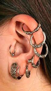 30 Unique Ear Piercing Ideas For The Adventurous Unusual Piercings Ear Cuff Earings Unique Ear Piercings
