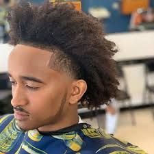 In this haircut, the blonde portion is curled and coiled while the sides and of low fades. 7 Cool Low Fade Haircuts For Black Men 2021 Trends