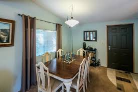 A spacious dining table in adjacent to the full kitchen at. Yosemite Cabin Wawona Updated 2021 Prices
