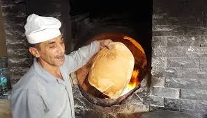 بالصور خبز التنور كيف يصنعه الاجداد النهار
