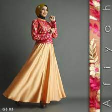 Kombinasi antara kain polos dan motif brokat yang cantik menciptakan perpaduan yang menarik gamis brokat berwarna maroon ini terlihat sangat serasi saat dipadukan dengan hijab berwarna coklat perpaduan warna brokat dan furing. Baju Pesta Premium Athiyah A207 Gold Butik Jingga
